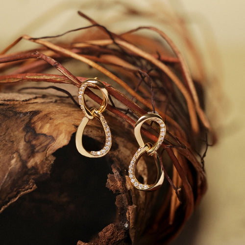 Original Möbius Strip Moissanite Sterling Silver Stud Earrings