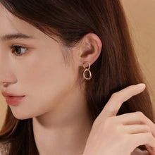 Load image into Gallery viewer, Original Möbius Strip Moissanite Sterling Silver Stud Earrings