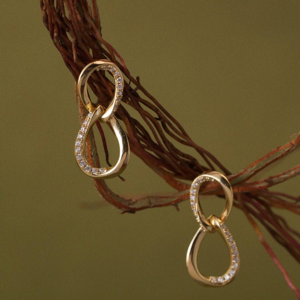 Original Möbius Strip Moissanite Sterling Silver Stud Earrings